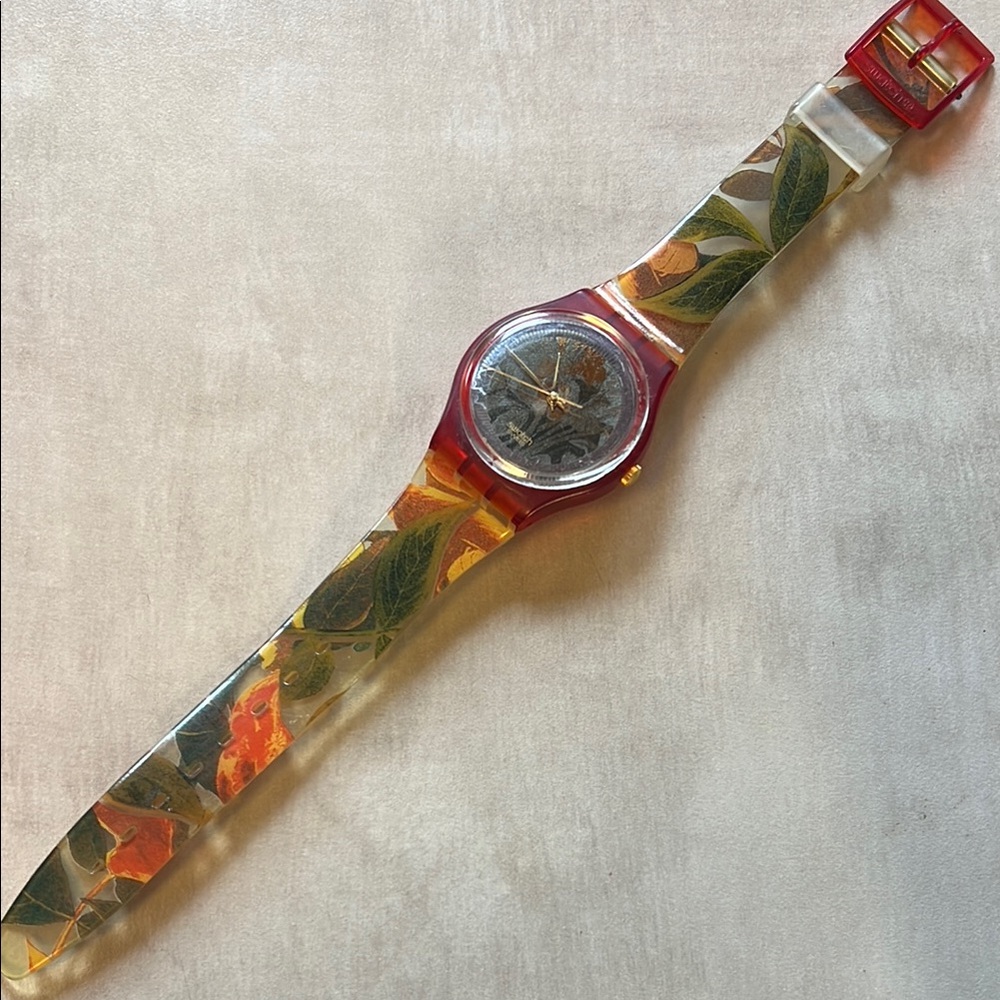 Swatch Red and Orange Leaf Pattern Watch